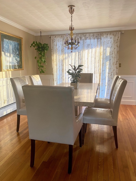 5 Oakwood Road Acton, MA 01720 - Photo 5 of 17 a view of a dining room with furniture window and wooden floor