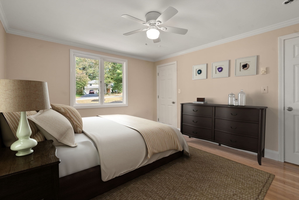 5 Oakwood Road Acton, MA 01720 - Photo 9 of 17 a bedroom with a bed and window