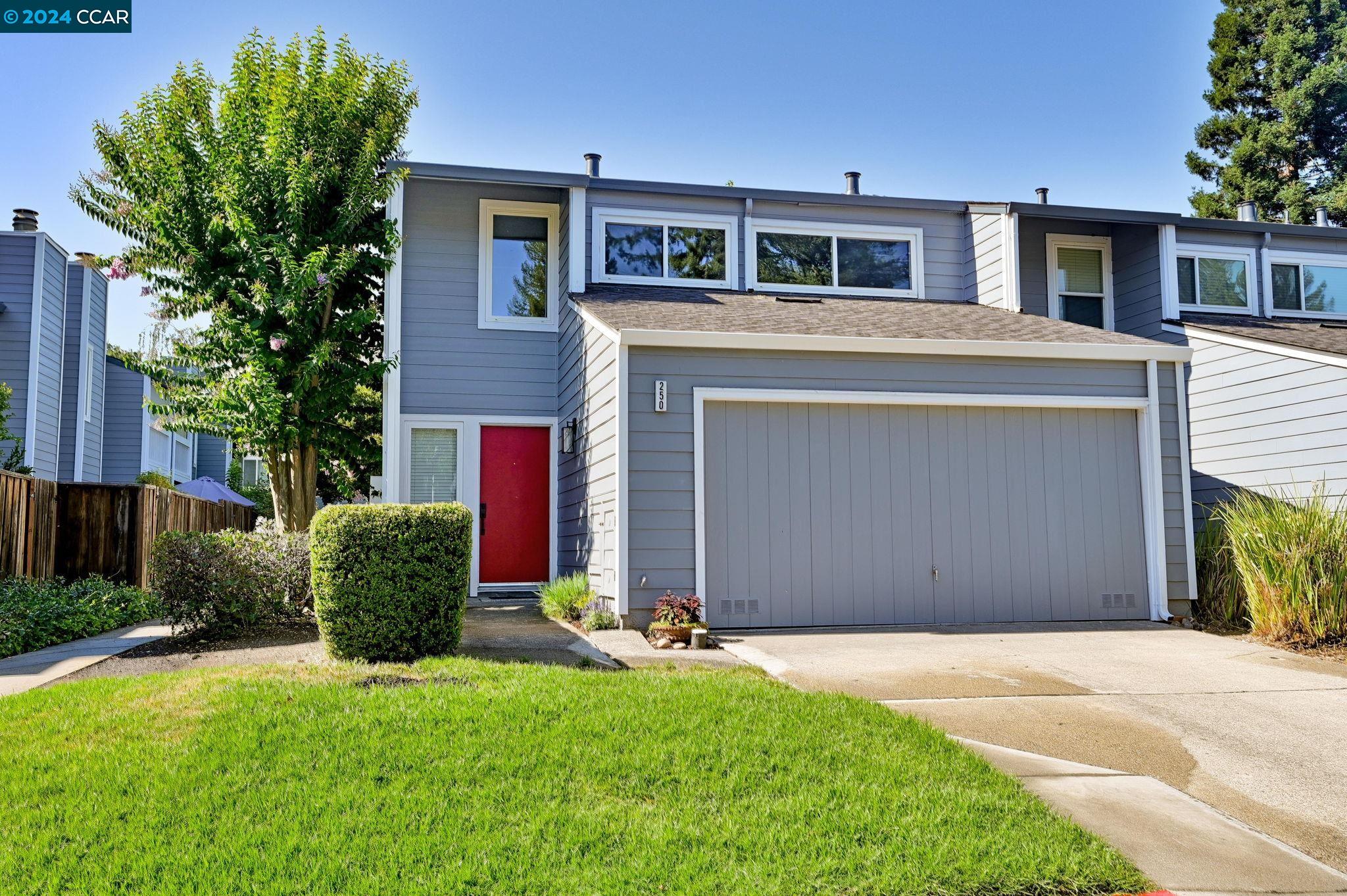 250 Ashley Circle Danville, CA 94526 - Photo 1 of 1 a front view of house with yard and trees in the background