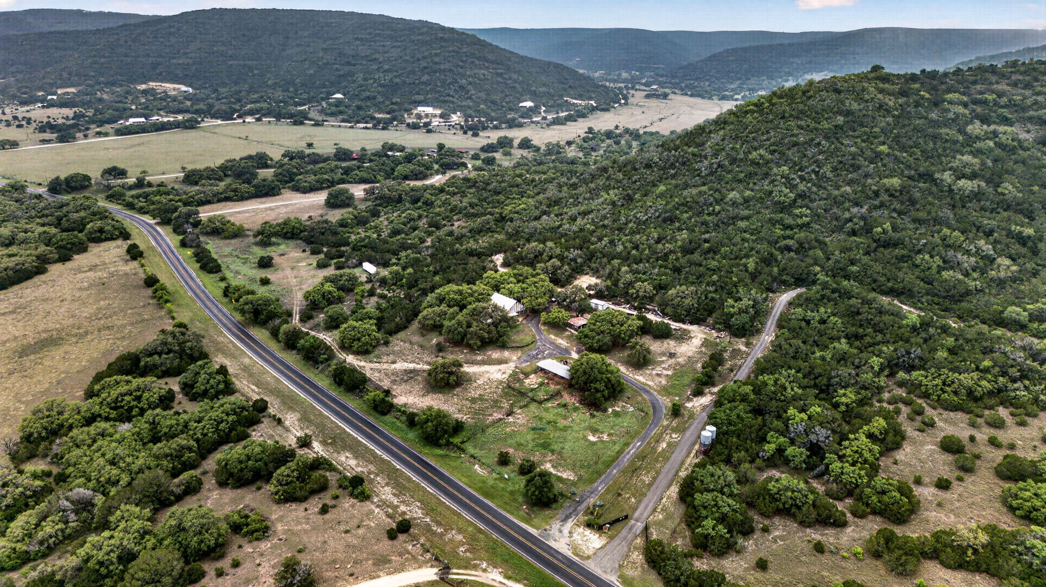 1850 Ranch Road 337 Leakey, TX 78873 - Photo 7 of 50 Aerial view showcasing usable acreage, natural landscape, and peaceful Hill Country setting
