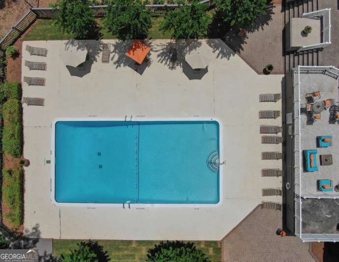 707 Franklin Road, Unit 613 Marietta, GA 30067 - Photo 9 of 13 an aerial view of a house with parking space