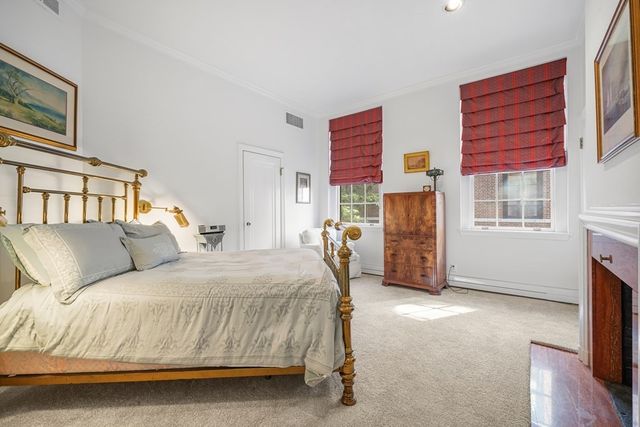a bathroom with a sink a mirror and a shower curtain