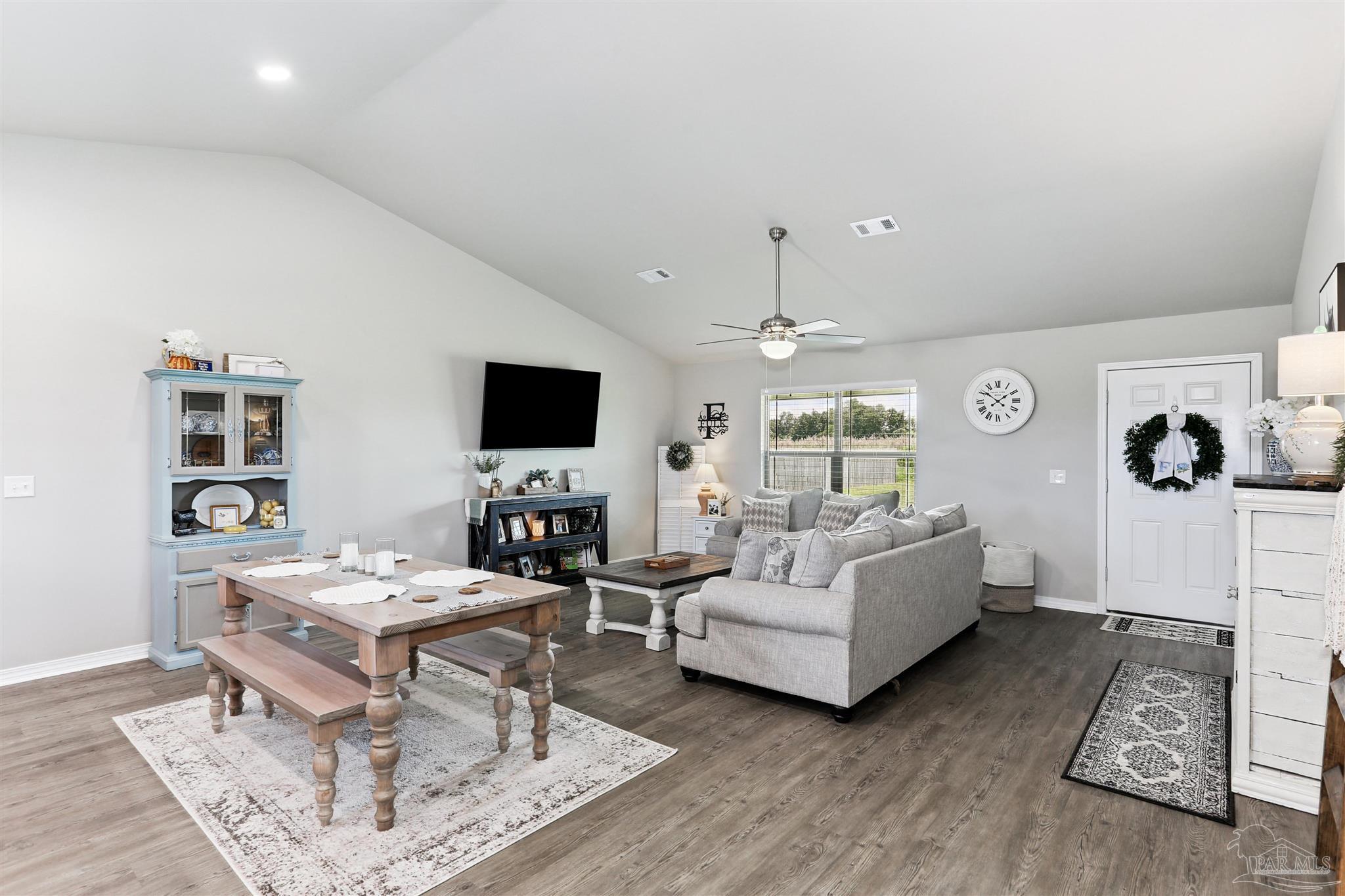 3545 Godwin Road Jay, FL 32565 - Photo 2 of 24 a living room with furniture and a flat screen tv