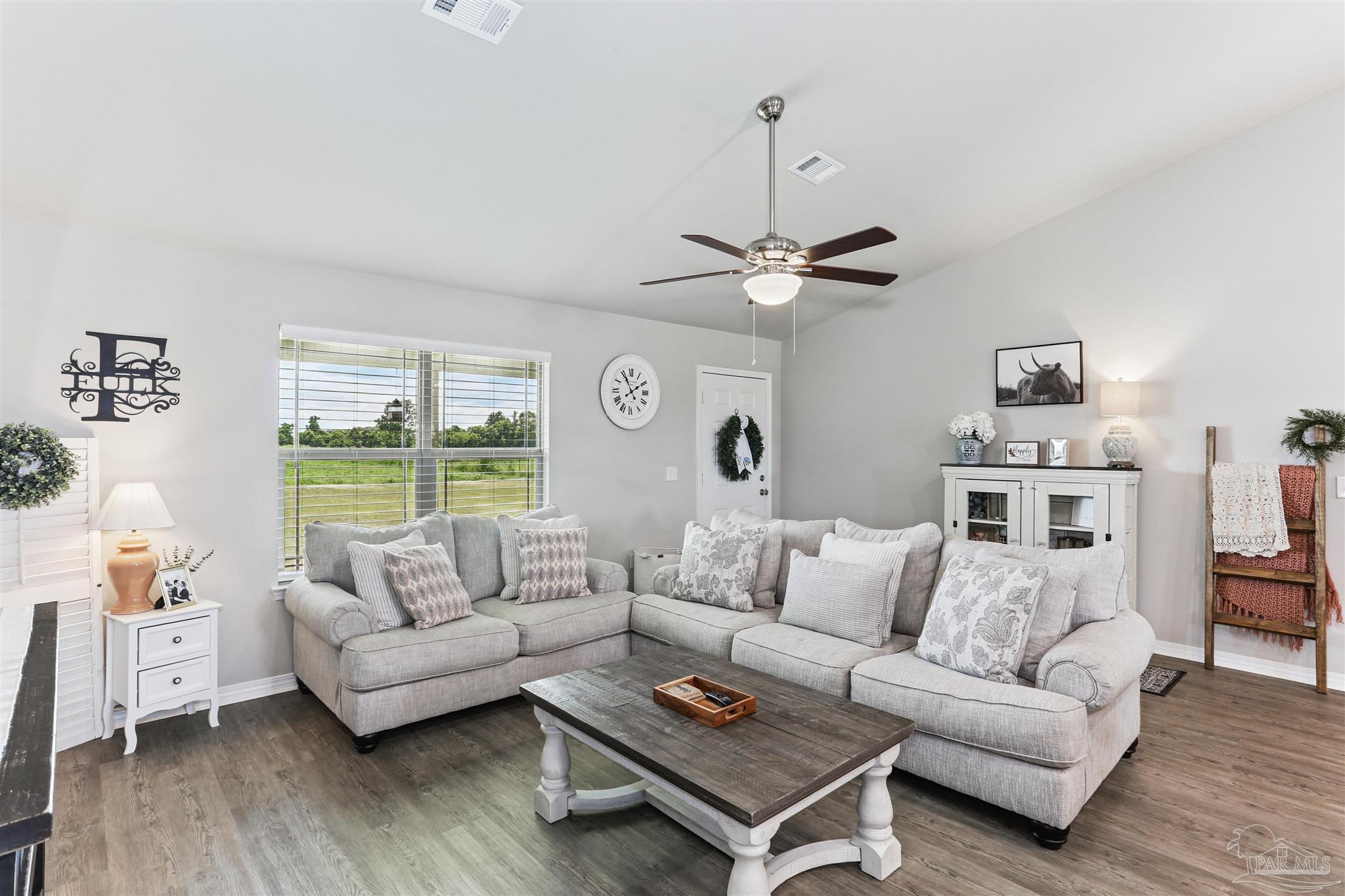 3545 Godwin Road Jay, FL 32565 - Photo 8 of 24 a living room with furniture and a large window