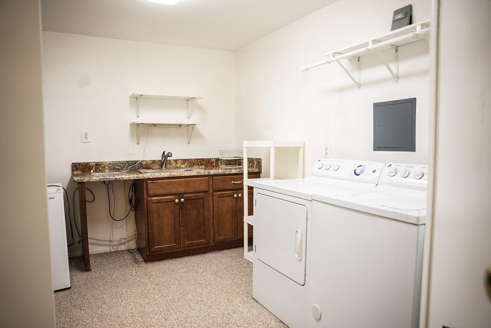 7691 Northern Oaks Court Springfield, VA 22153 - Photo 18 of 23 Basement kitchenette & laundry space.