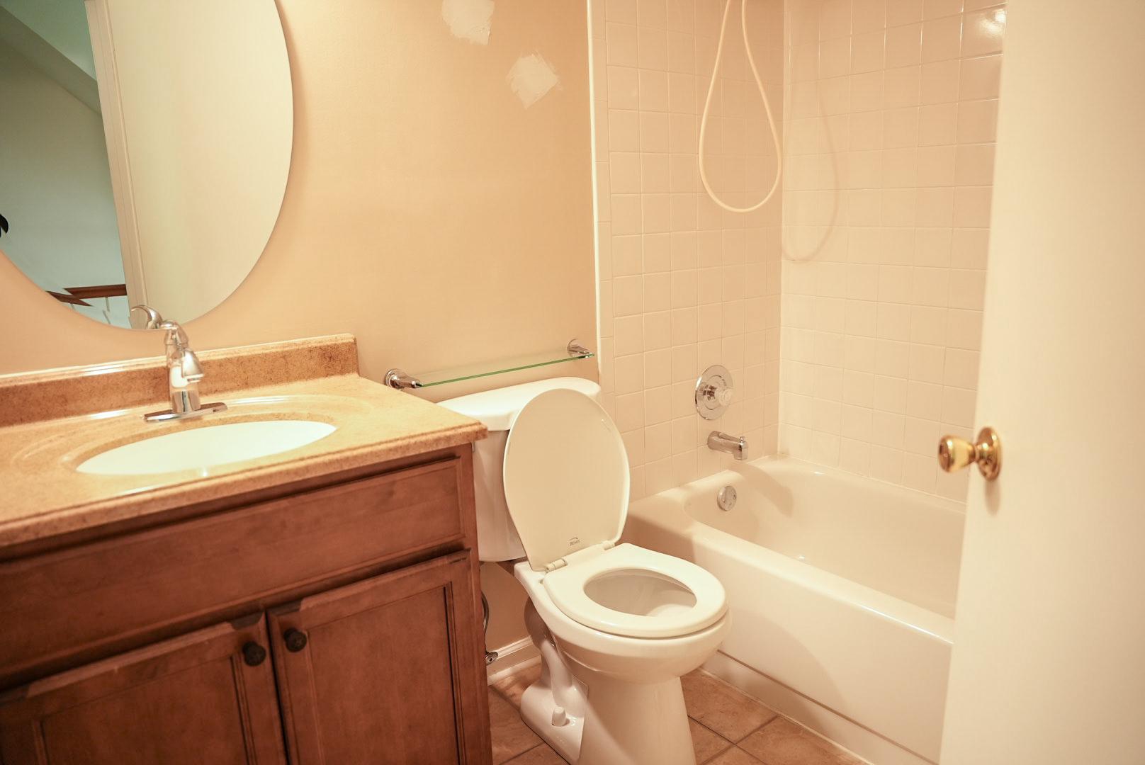 7691 Northern Oaks Court Springfield, VA 22153 - Photo 7 of 23 Upper full bath a new floor & vanity to modernize