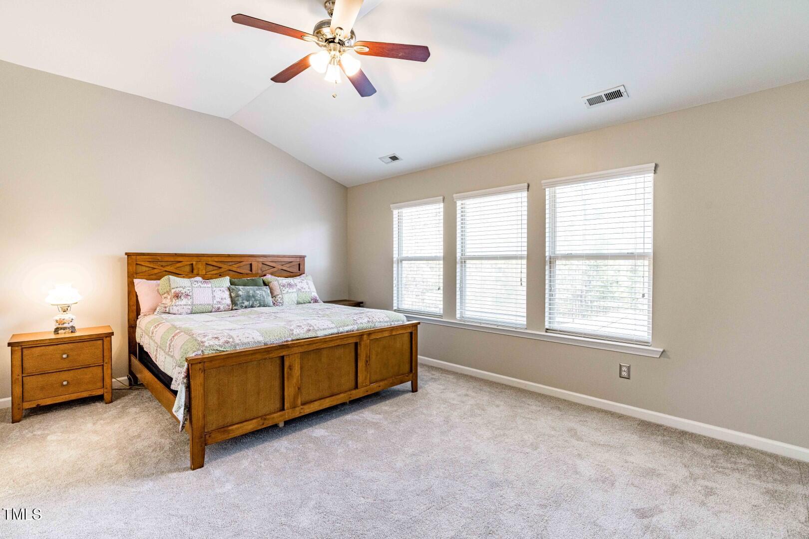1017 Lakeview Road Durham, NC 27712 - Photo 17 of 32 a bedroom with a bed and window
