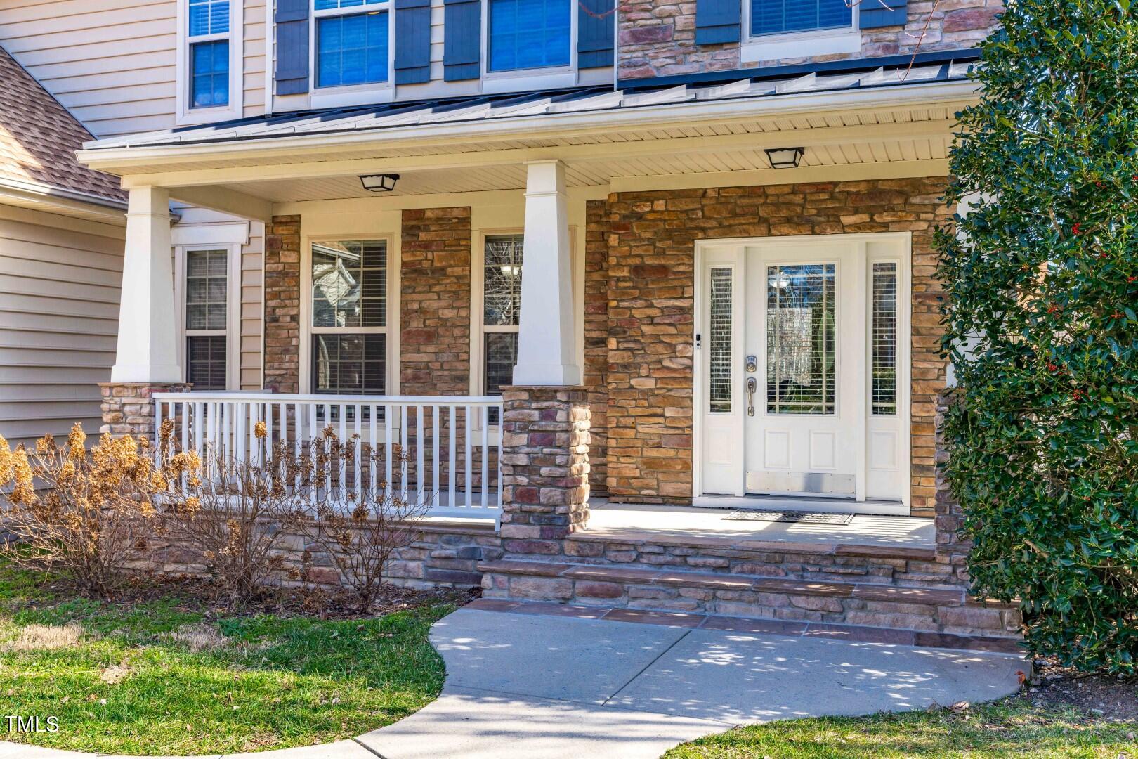 1017 Lakeview Road Durham, NC 27712 - Photo 2 of 32 a front view of a house with a yard