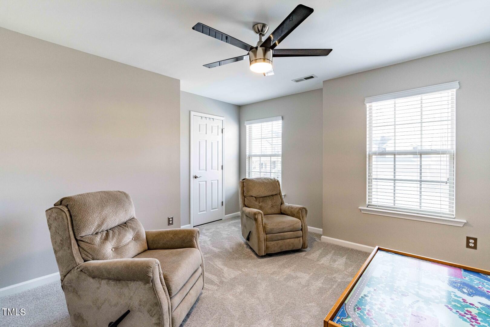 1017 Lakeview Road Durham, NC 27712 - Photo 21 of 32 a living room with furniture and a window
