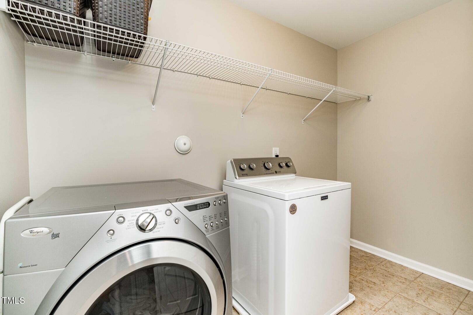 1017 Lakeview Road Durham, NC 27712 - Photo 25 of 32 a utility room with dryer and washer