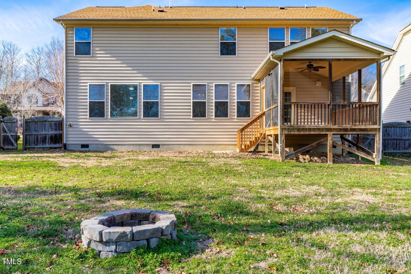1017 Lakeview Road Durham, NC 27712 - Photo 26 of 32 a view of a house with a backyard