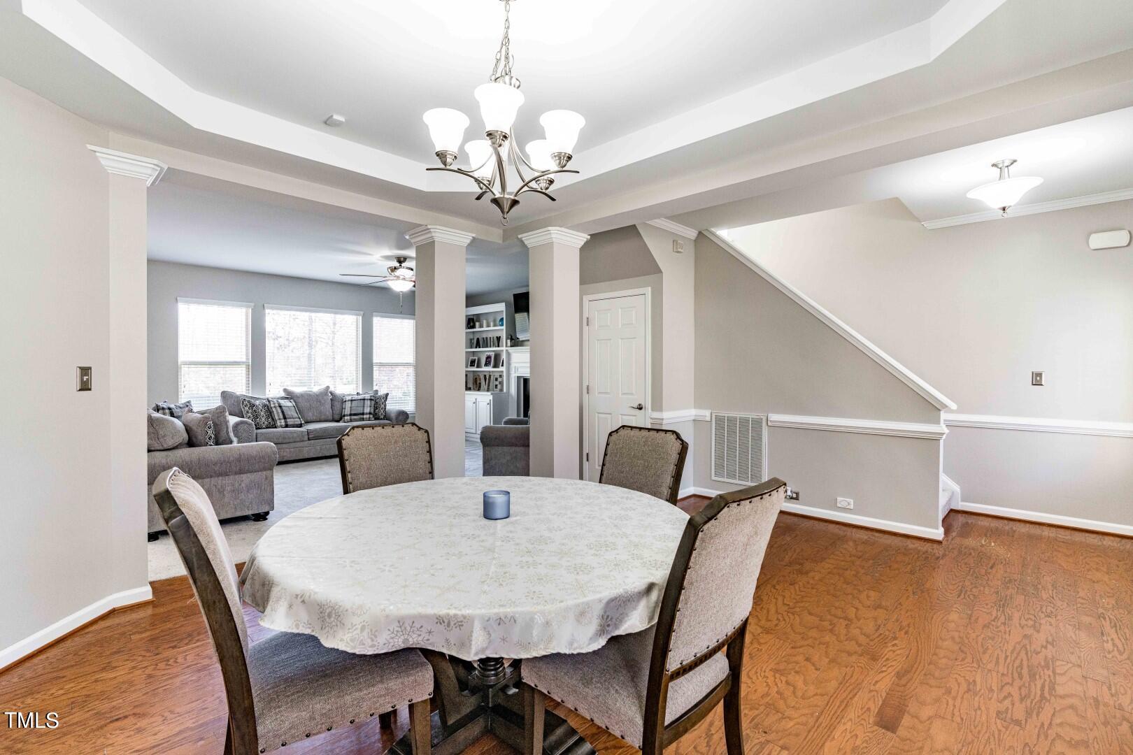 1017 Lakeview Road Durham, NC 27712 - Photo 3 of 32 a view of a dining room with furniture and wooden floor