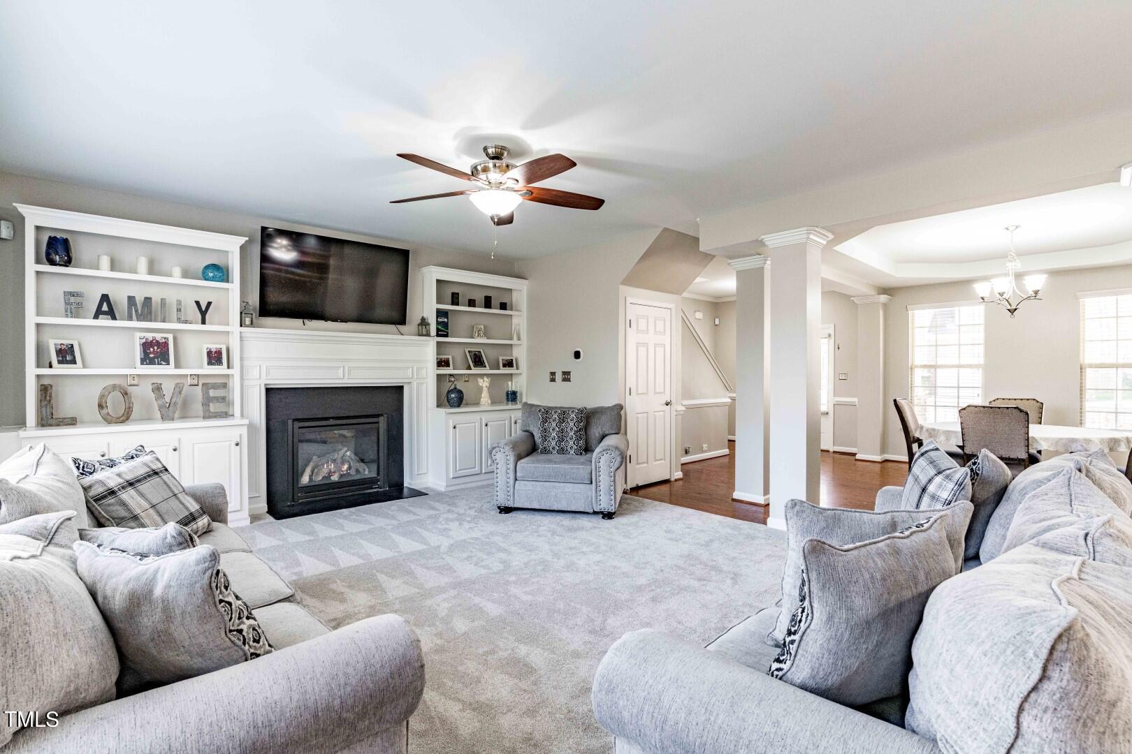 1017 Lakeview Road Durham, NC 27712 - Photo 7 of 32 a living room with furniture fireplace and flat screen tv