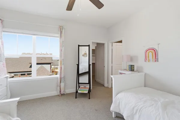 a room with a bed and furniture