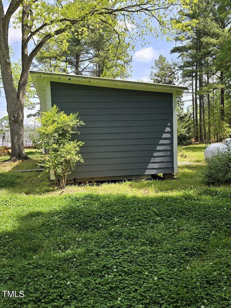 511 Providence Road Oxford, NC 27565 - Photo 13 of 56 Side of the wood working shop. Has propane hooked up and power