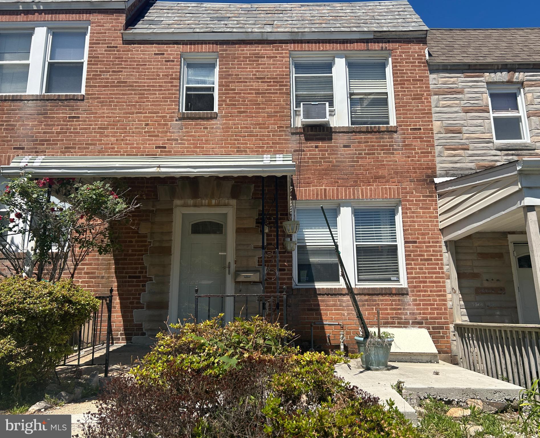 4014 Century Road Baltimore, MD 21206 - Photo 1 of 19 a front view of a house with a yard