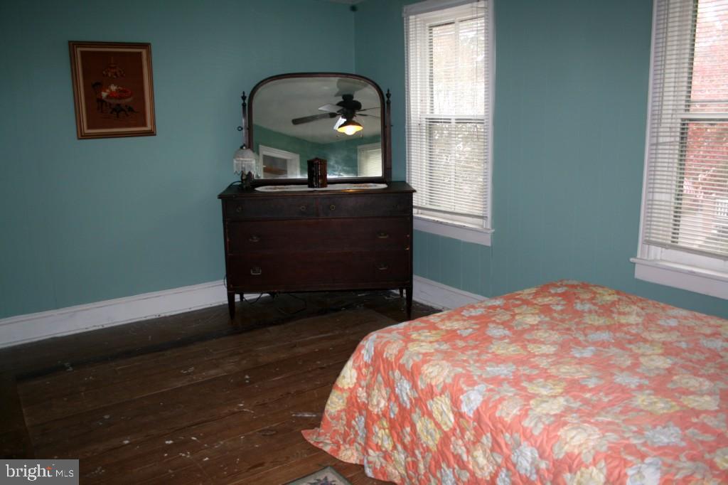 34 East Center Street Lititz, PA 17543 - Photo 18 of 21 a bedroom with a bed and a dresser