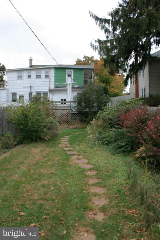 34 East Center Street Lititz, PA 17543 - Photo 6 of 21 a backyard of a house with plants and large trees