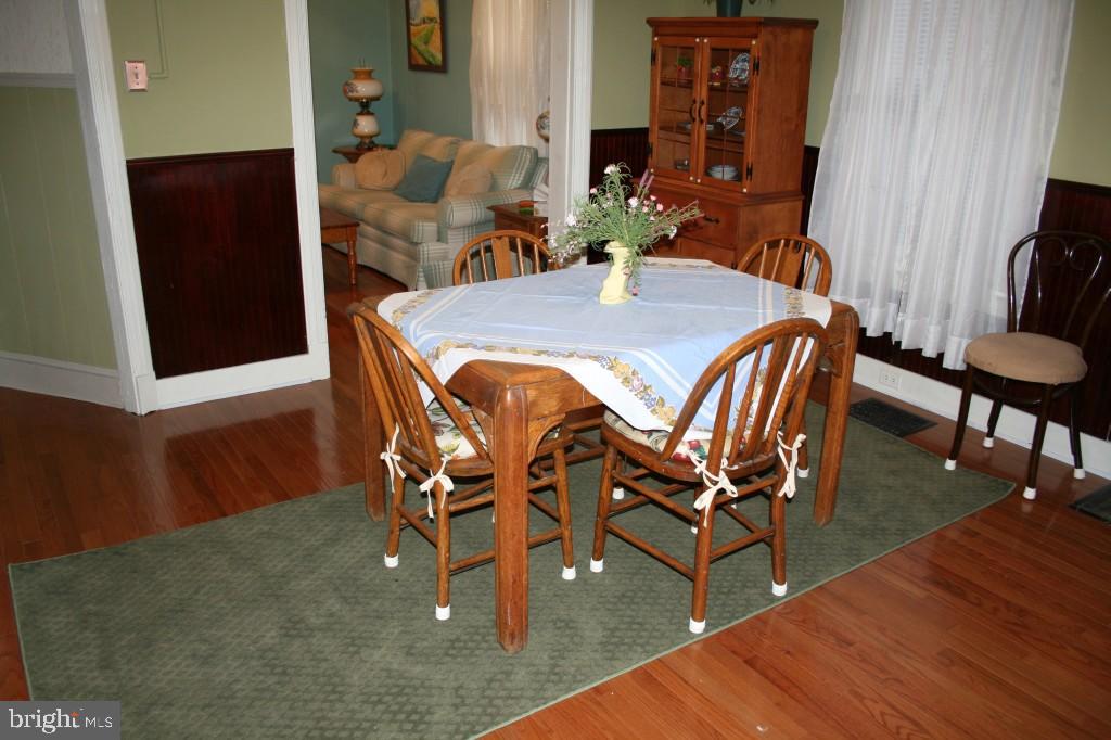 34 East Center Street Lititz, PA 17543 - Photo 9 of 21 a view of a dining room with furniture and wooden floor