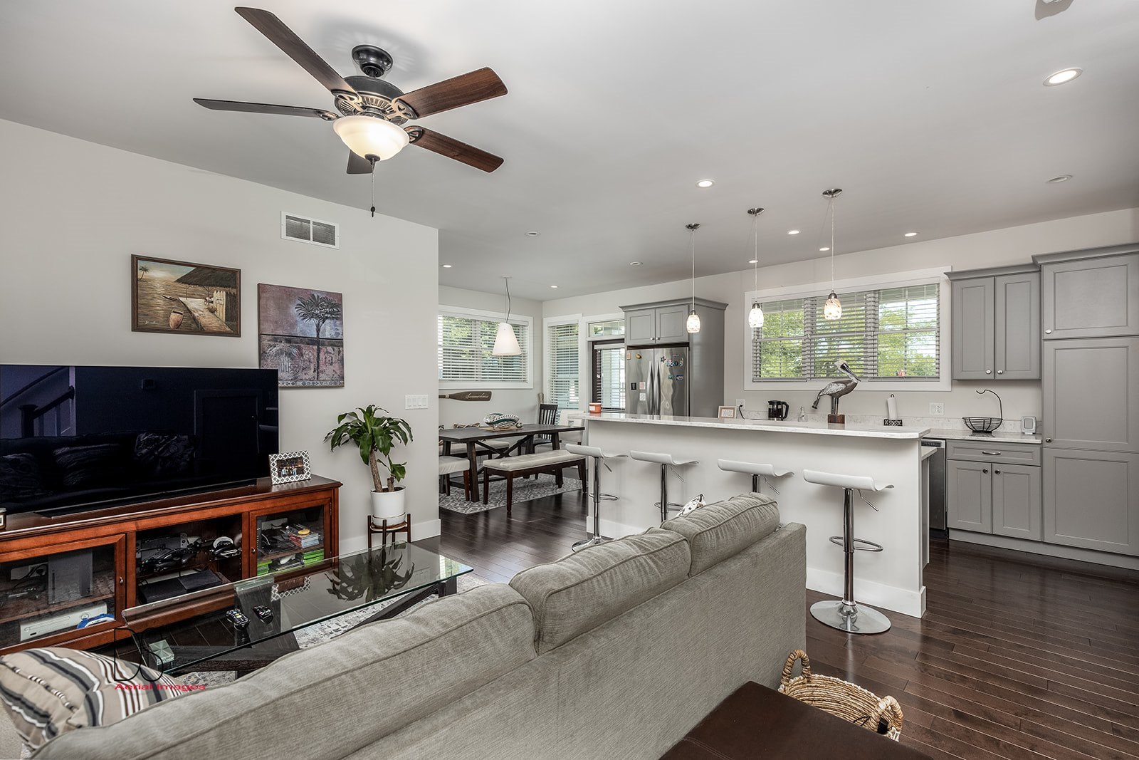 4 Pelican Landing Ottawa, IL 61350 - Photo 15 of 29 a living room with stainless steel appliances kitchen island granite countertop furniture and a flat screen tv