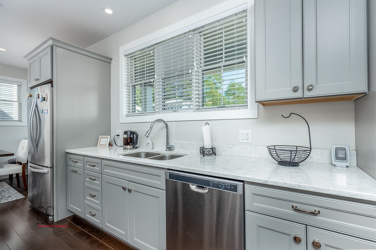 4 Pelican Landing Ottawa, IL 61350 - Photo 21 of 29 a kitchen with stainless steel appliances white cabinets and a window