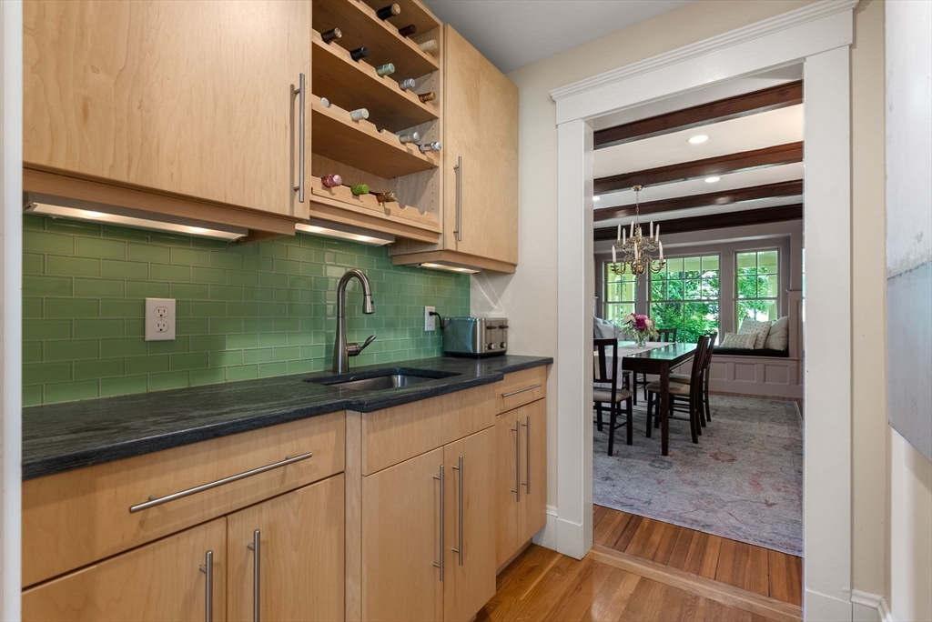 260 Glen Road Weston, MA 02493 - Photo 13 of 42 a kitchen with stainless steel appliances granite countertop a sink and cabinets