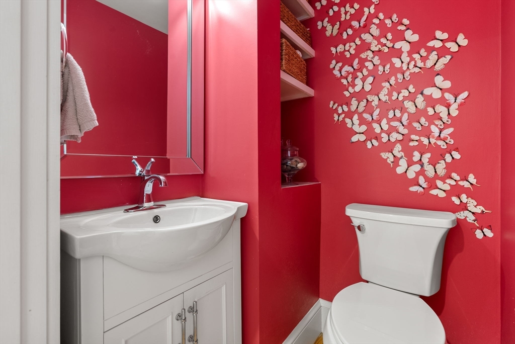 260 Glen Road Weston, MA 02493 - Photo 24 of 42 a bathroom with a sink mirror and toilet