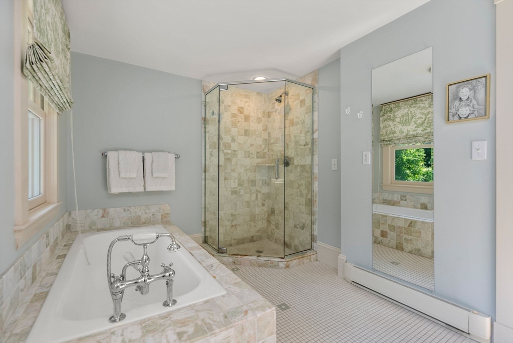 260 Glen Road Weston, MA 02493 - Photo 29 of 42 a bathroom with a bathtub and shower