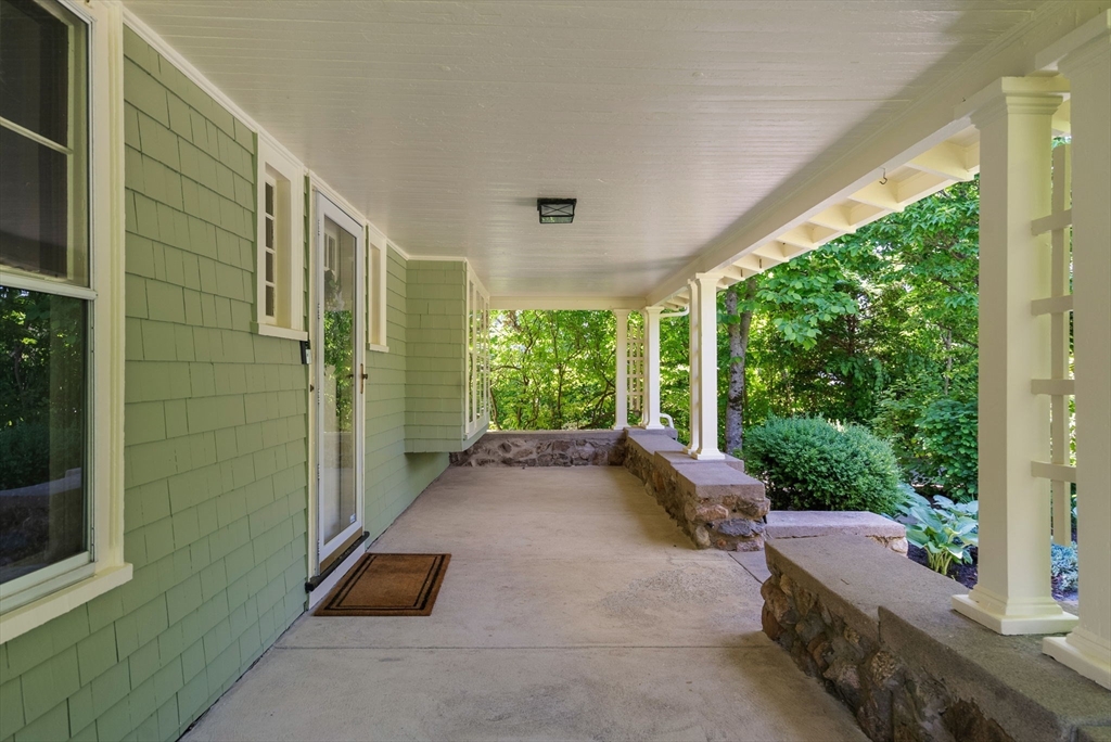 260 Glen Road Weston, MA 02493 - Photo 4 of 42 a backyard of a house with outdoor seating