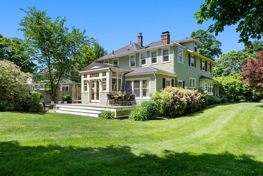 260 Glen Road Weston, MA 02493 - Photo 41 of 42 a front view of a house with swimming pool having outdoor seating