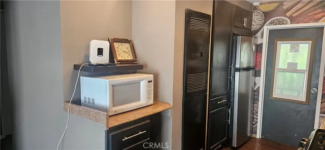 a view of a hallway with a window