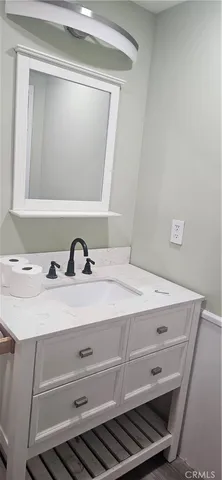 an empty room with windows and entrance