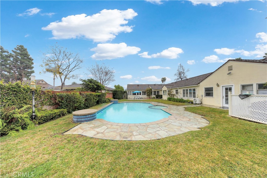 2835 Devonport Road San Marino, CA 91108 - Photo 47 of 54 a view of a house with swimming pool