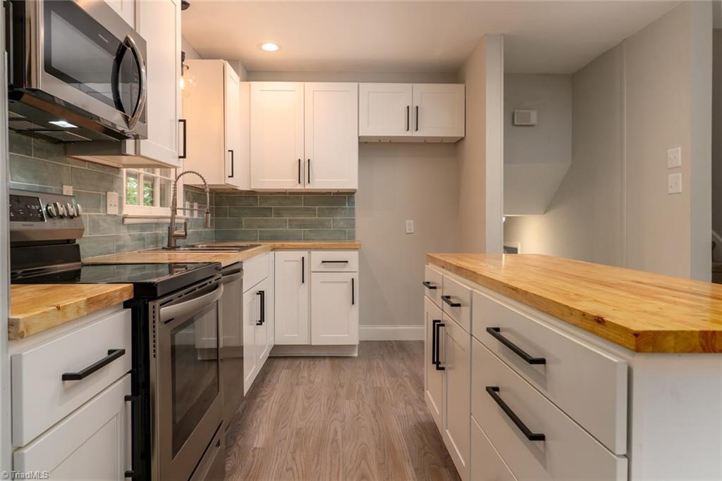 2210 Waynick Street High Point, NC 27265 - Photo 2 of 28 Brand new kitchen with butcher block counter tops.