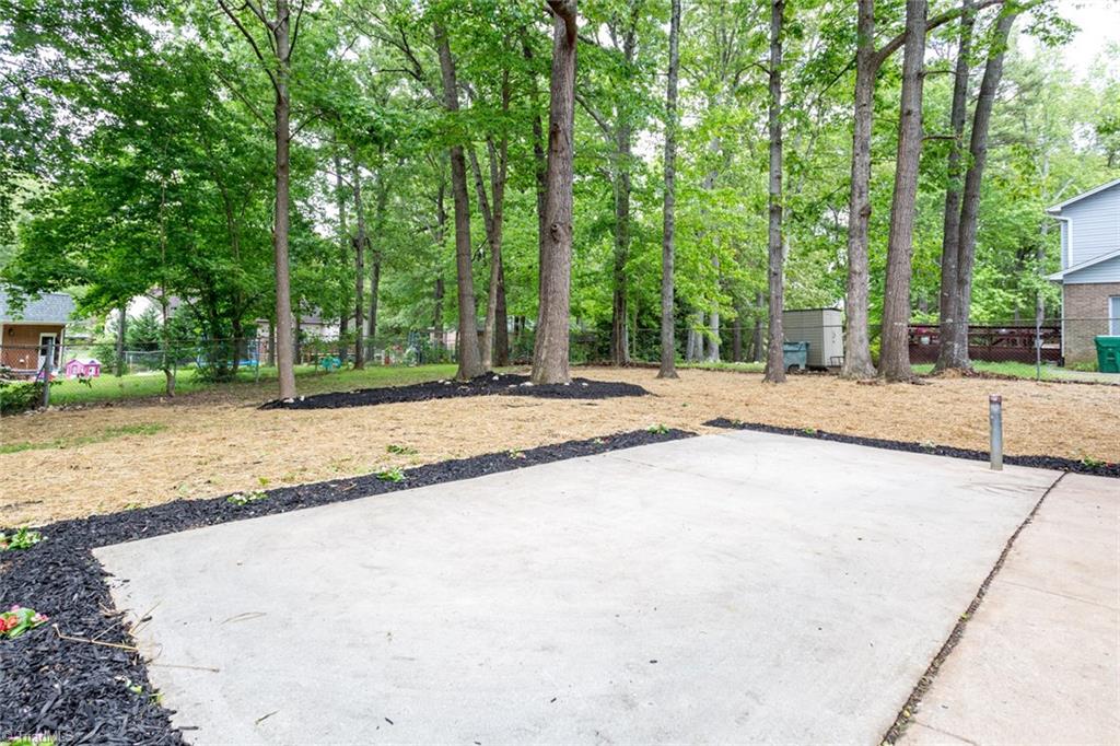 2210 Waynick Street High Point, NC 27265 - Photo 24 of 28 backyard concrete patio
