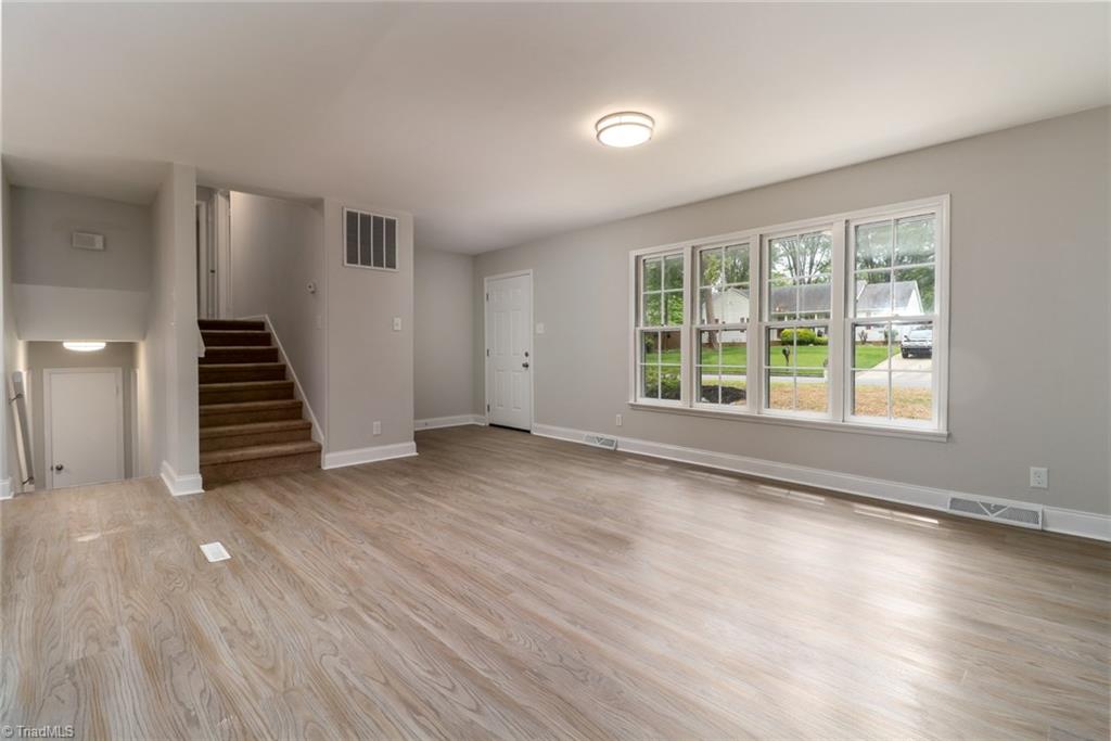 2210 Waynick Street High Point, NC 27265 - Photo 10 of 28 Large living room space with plenty of natural light.