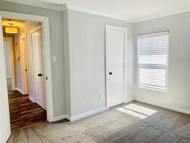 602 South Chestnut Street McKinney, TX 75069 - Photo 21 of 24 a view of a room with wooden floor and windows