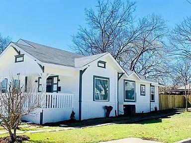 602 South Chestnut Street McKinney, TX 75069 - Photo 23 of 24 a view of a house with a yard