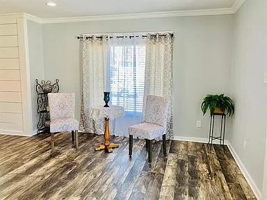 602 South Chestnut Street McKinney, TX 75069 - Photo 6 of 24 a living room with furniture and a wooden floor