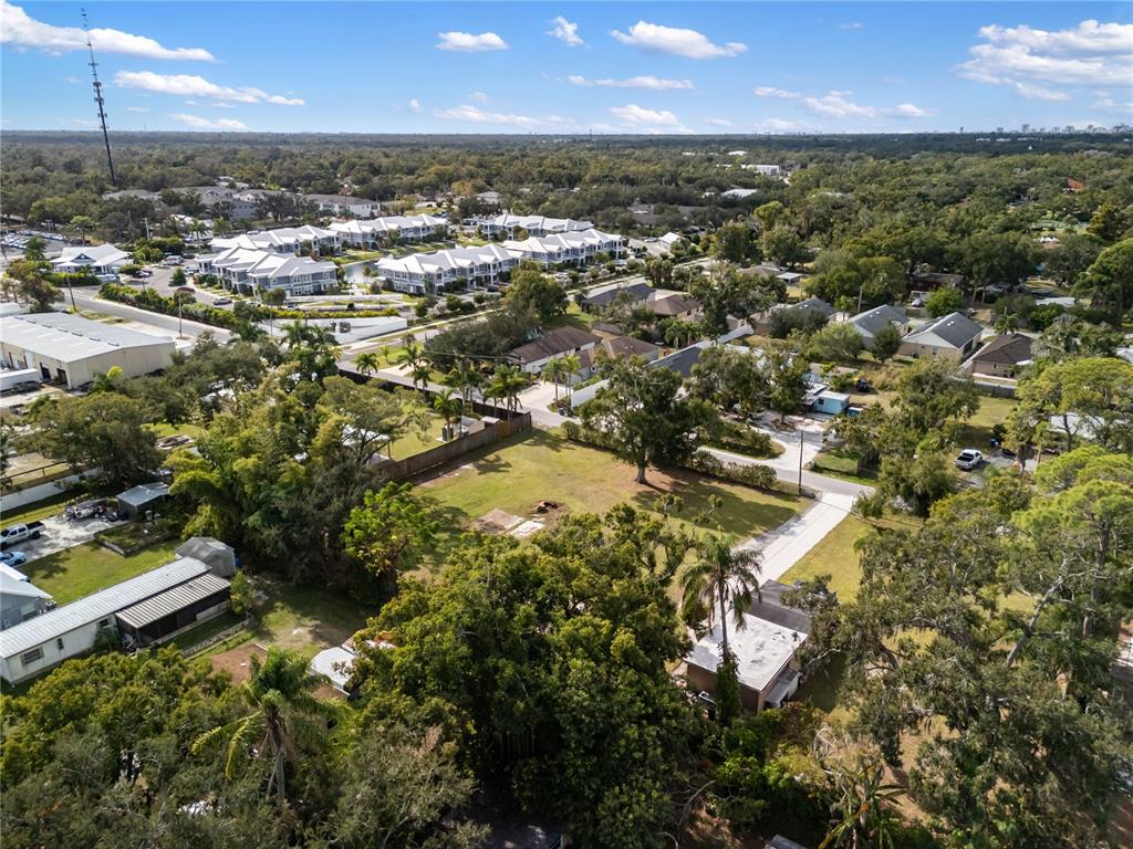 Houle Sarasota, FL 34232 - Photo 8 of 9 an aerial view of residential houses with outdoor space and trees