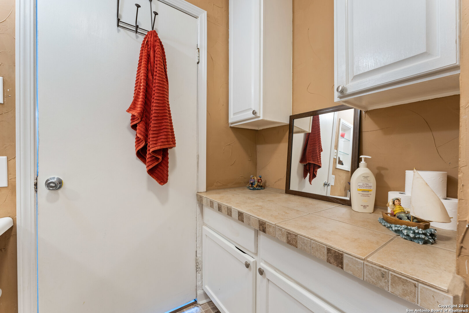 1843 Rhinestone Canyon Lake, TX 78133 - Photo 18 of 39 a kitchen with a sink and a refrigerator