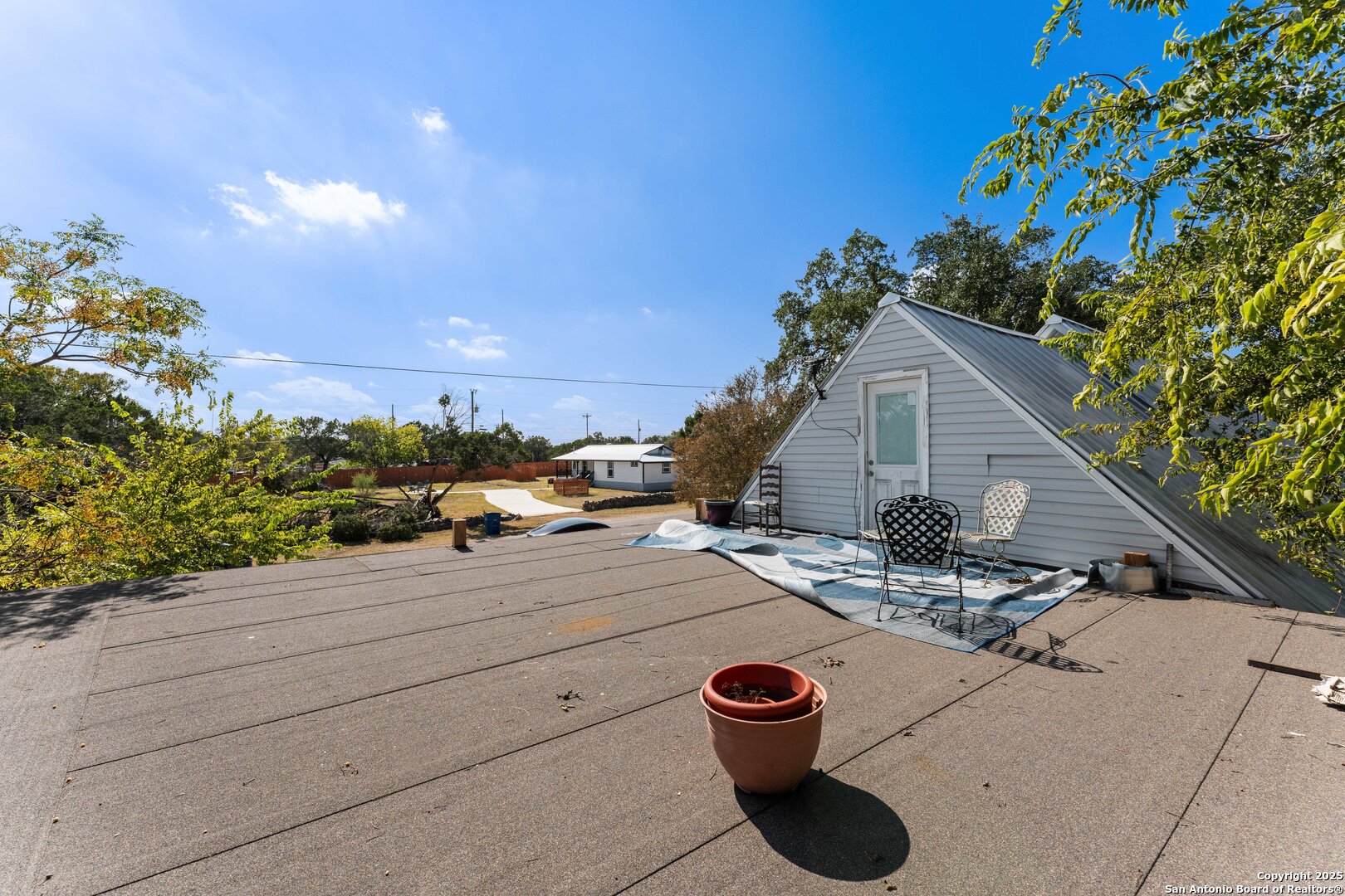 1843 Rhinestone Canyon Lake, TX 78133 - Photo 28 of 39 a view of a terrace with a sink