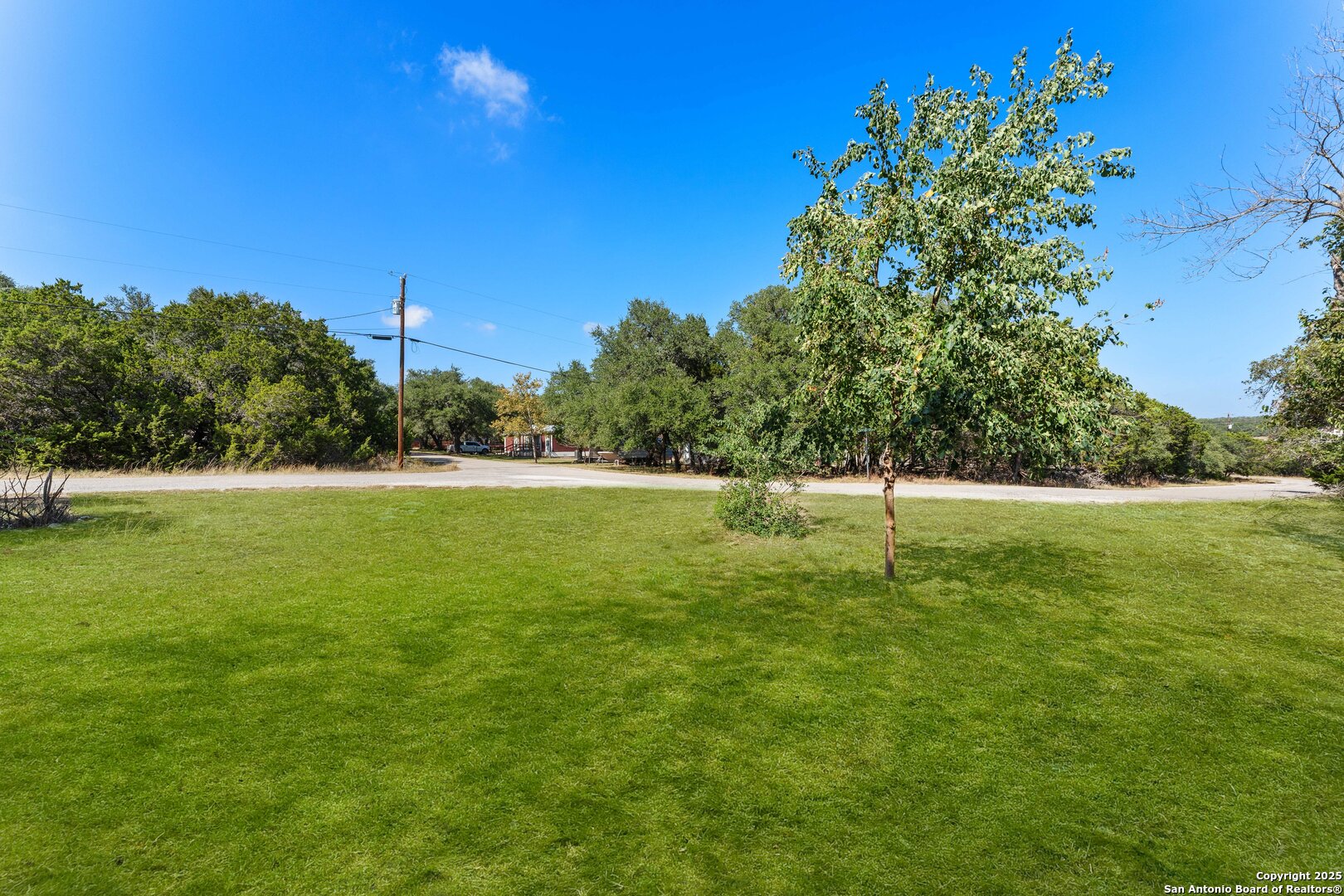 1843 Rhinestone Canyon Lake, TX 78133 - Photo 36 of 39 a view of a green field