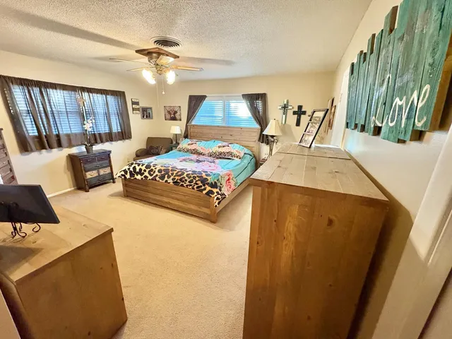 a living room with a couch and a table