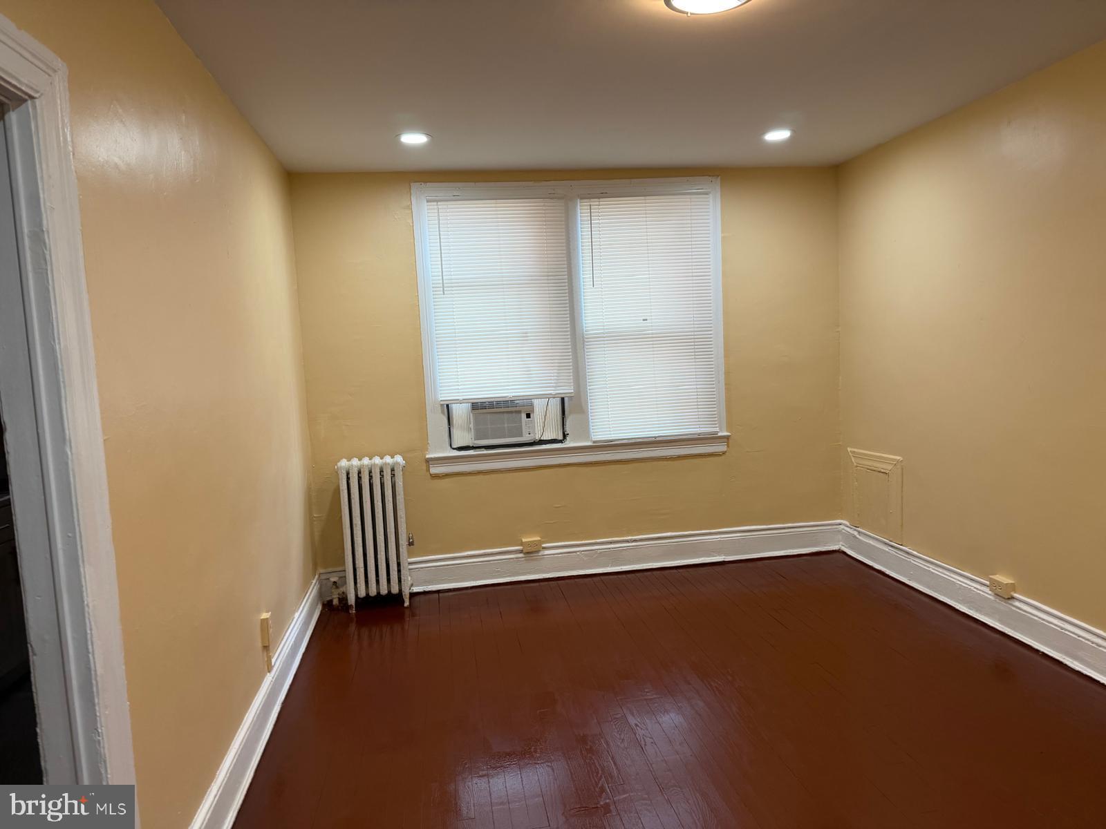 1457 Park Road Northwest, Unit 107 Washington, DC 20010 - Photo 42 of 42 Bright, inviting space with warm tones.