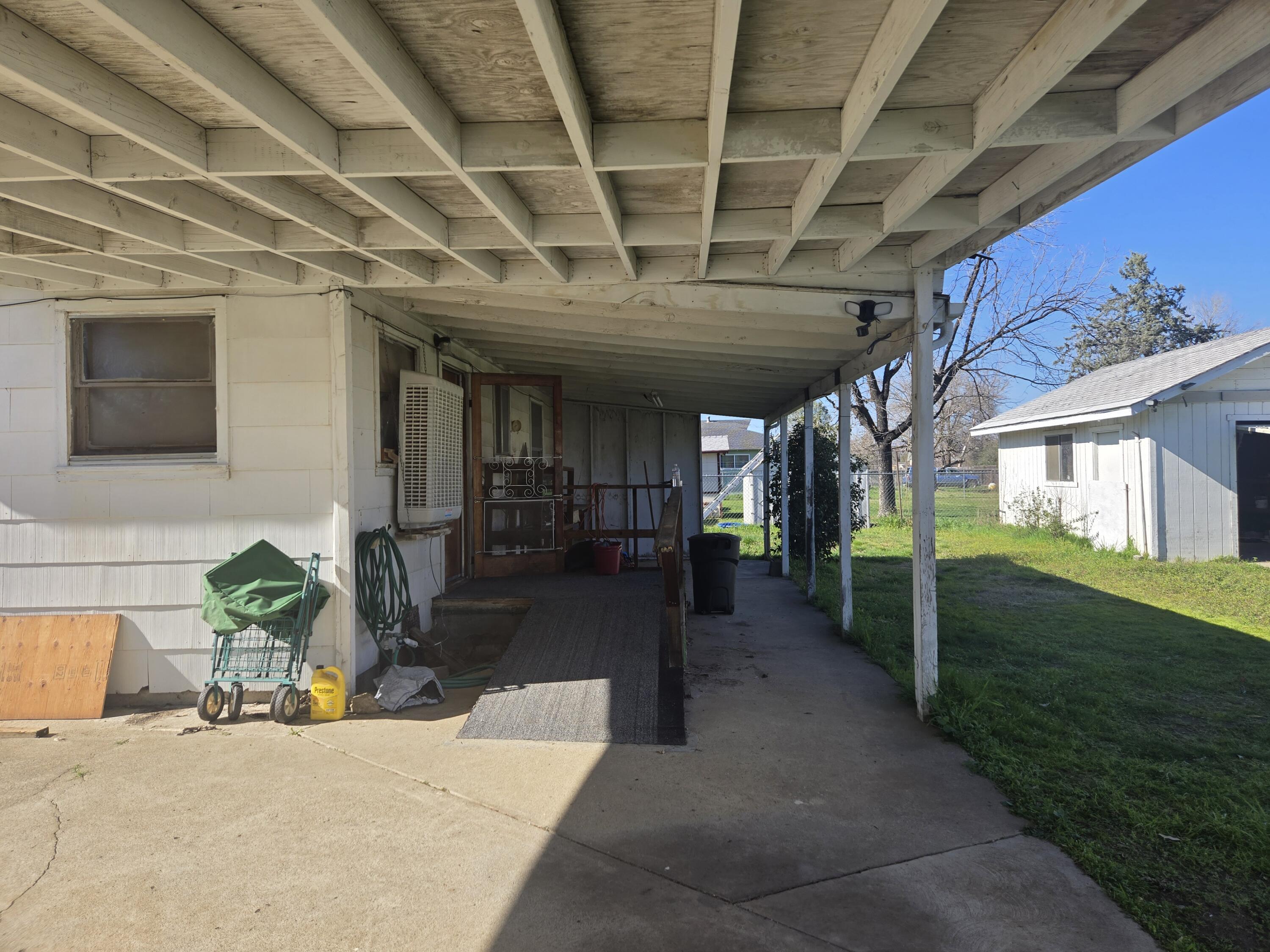 2609 Albert Road Anderson, CA 96007 - Photo 30 of 40 2609 Albert carport to back paiio