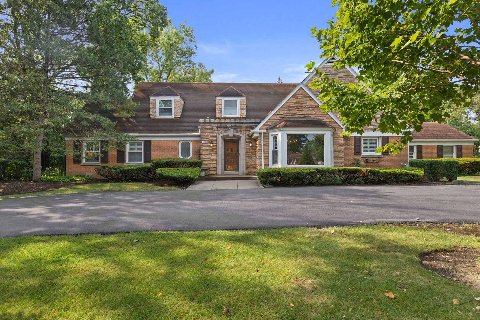 1011 Central Road Glenview, IL 60025 - Photo 2 of 36 a front view of a house with a yard