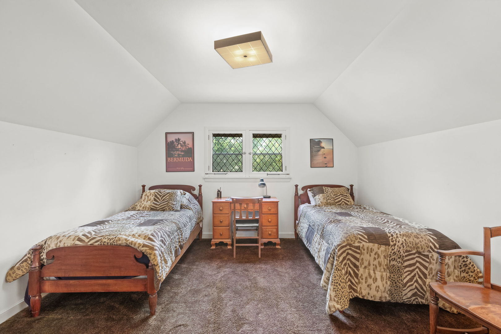 1011 Central Road Glenview, IL 60025 - Photo 23 of 36 a bedroom with a bed and wooden floor