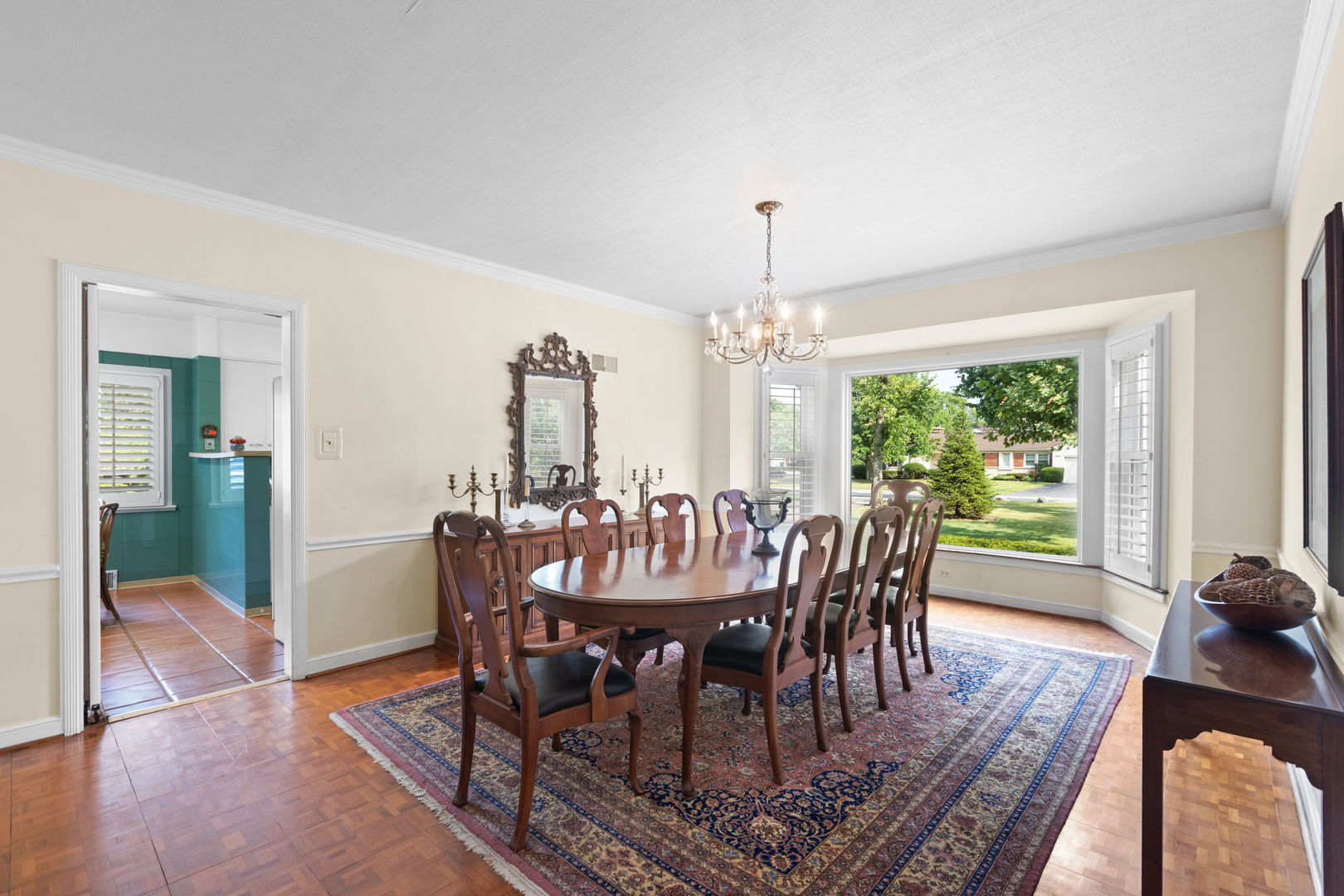 1011 Central Road Glenview, IL 60025 - Photo 9 of 36 a view of a dining room with furniture window and wooden floor