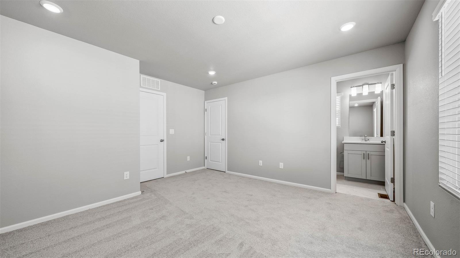 3970 North Rome Street Aurora, CO 80019 - Photo 14 of 22 an empty room with a bathroom
